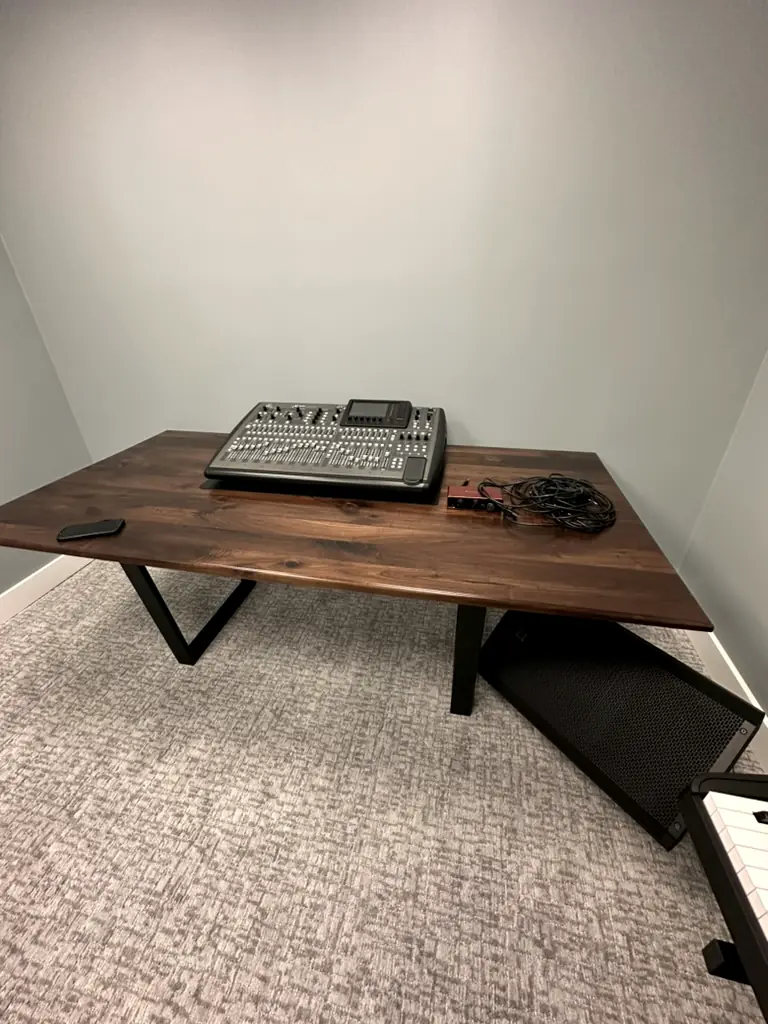 Console going in, walnut desk first