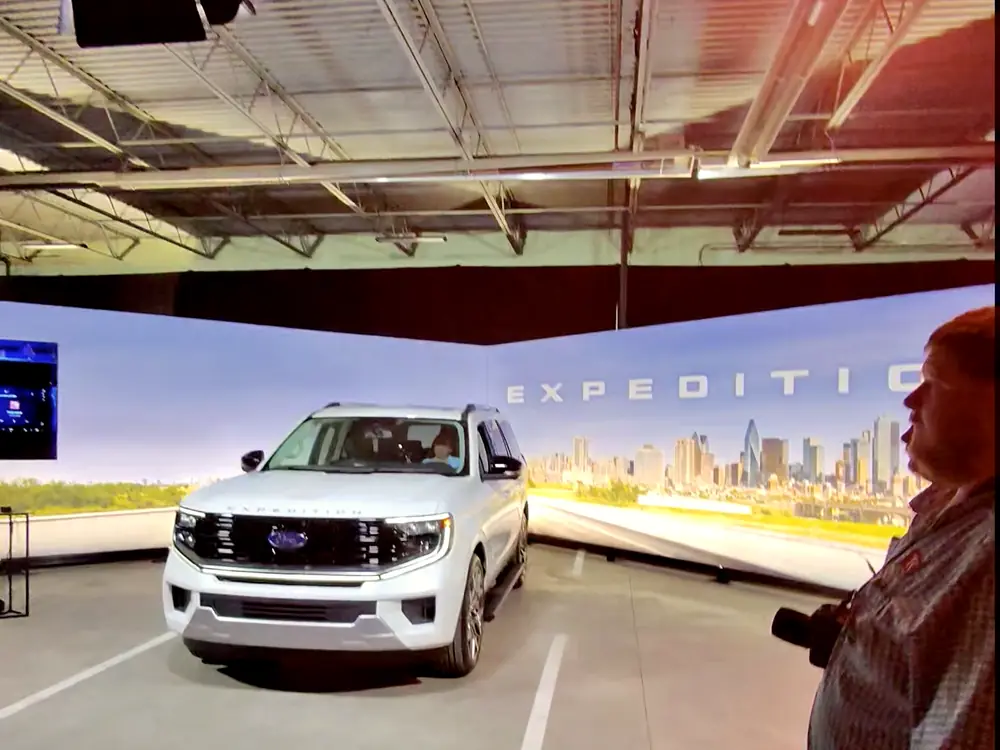 Covering a vehicle reveal on an LED volume stage at a trade show
